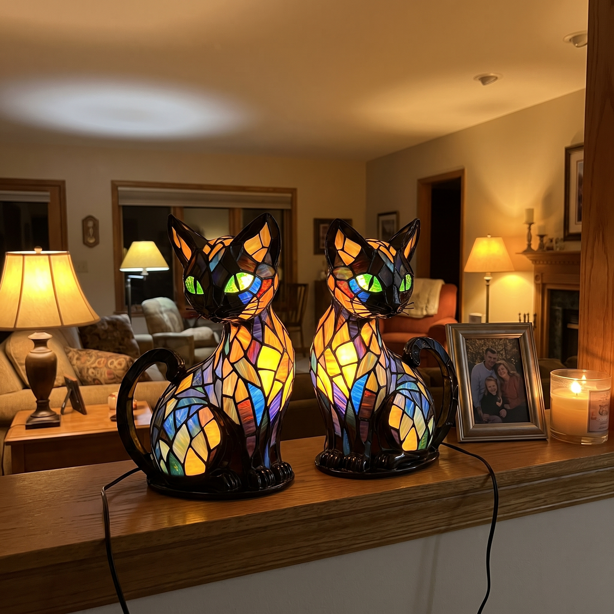 Two Moggy Lamps on a mantelpiece