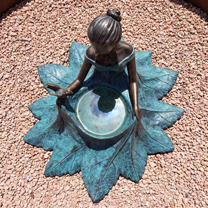 Top view of the leafy verdigris gown and water bowl