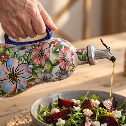 Drizzling olive oil over a beetroot salad from the Hollyhock dispenser