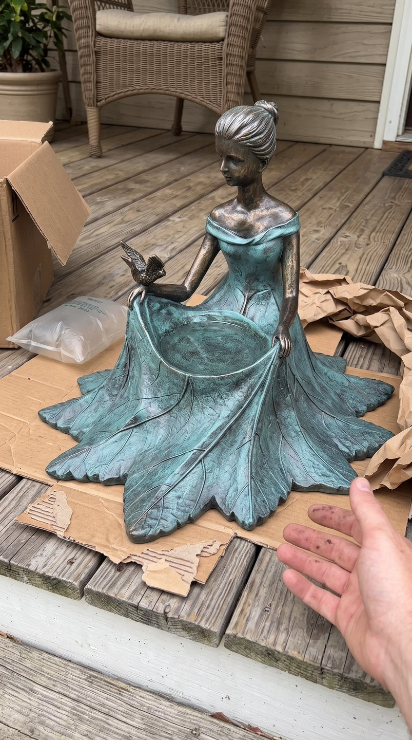Customer photo — bird bath just unboxed on a porch