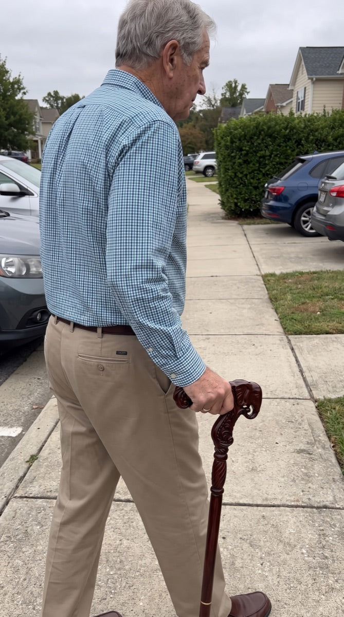 Customer photo: elephant cane on a sidewalk