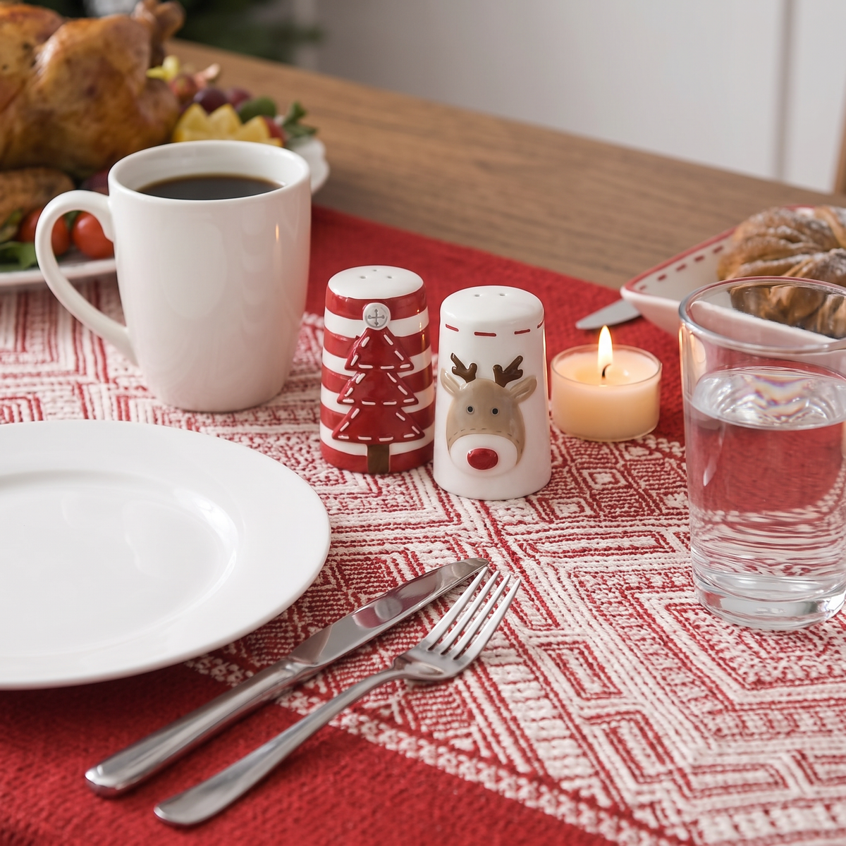 The pair on a set Christmas dinner table