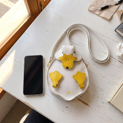 The duck bag next to a smartphone for size