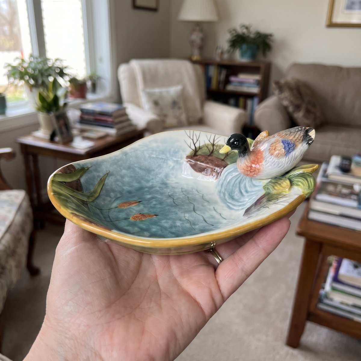 Mallard dish on an open hand for size