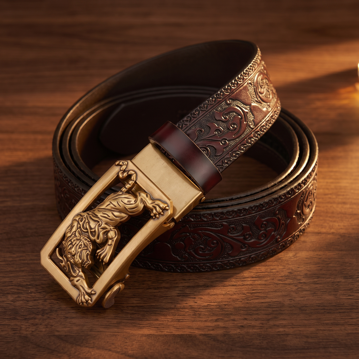 Tiger buckle on the dark burgundy embossed strap
