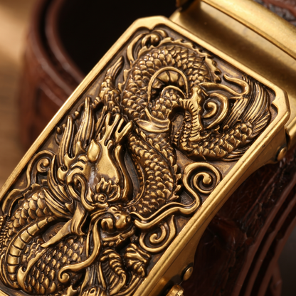 Macro close-up of the antique brass dragon buckle relief