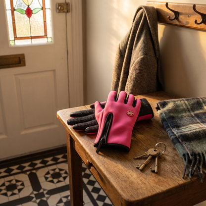 Rose Pink winter gloves on a Victorian hall table