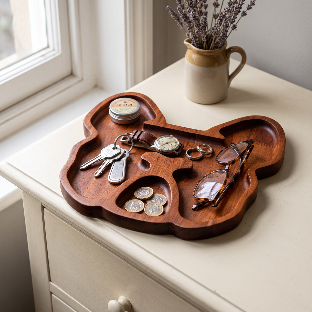 Bulldog serving tray used as a catch-all on a chest of drawers
