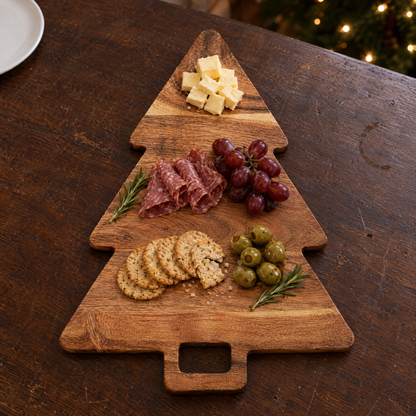Tree board served with cheese, salami, grapes and crackers