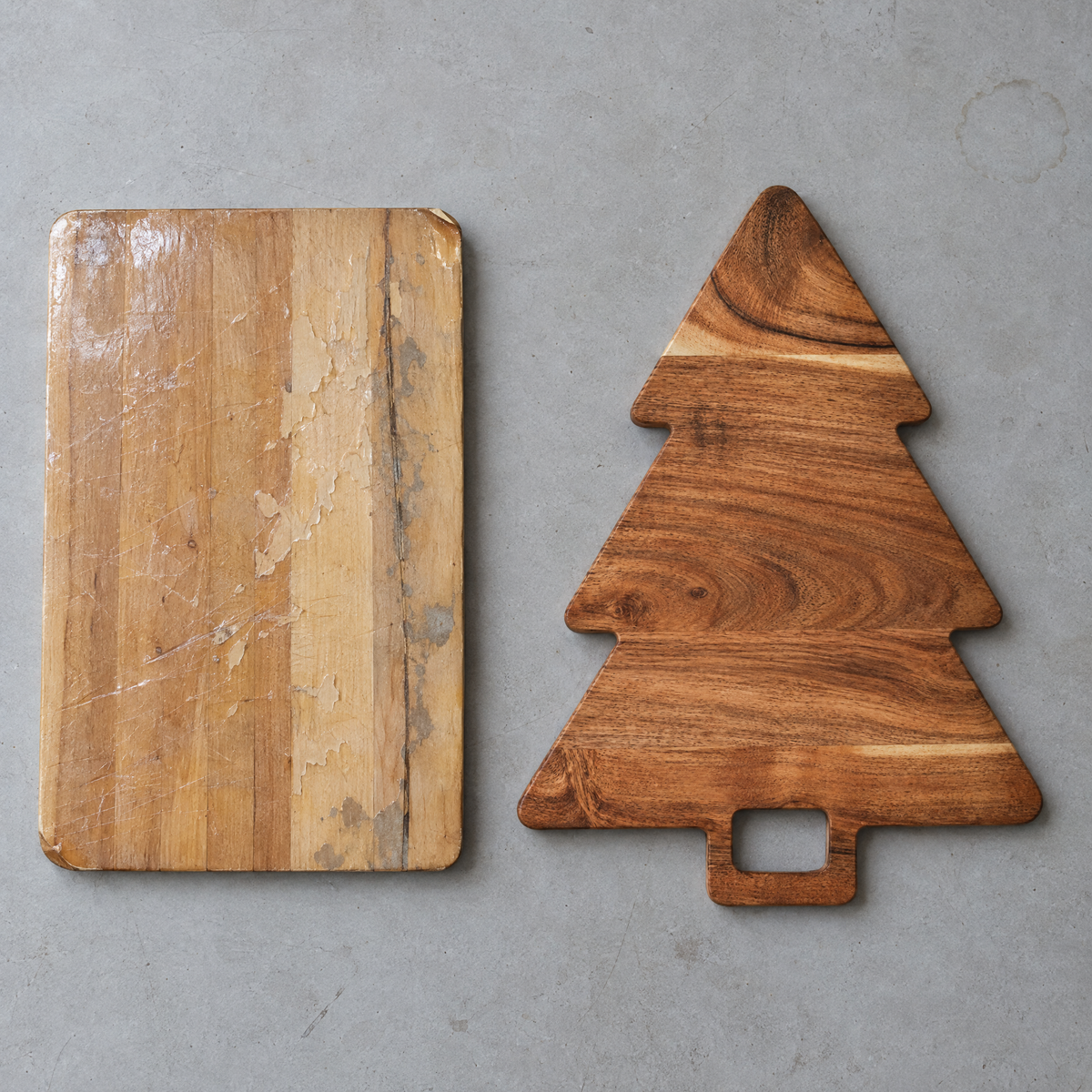Peeling lacquered store board next to the oiled acacia tree board