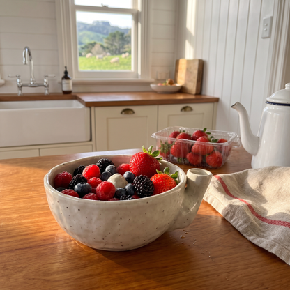 Lynley's Berry Washing Bowl in Schist Cream with fresh berries in a villa kitchen