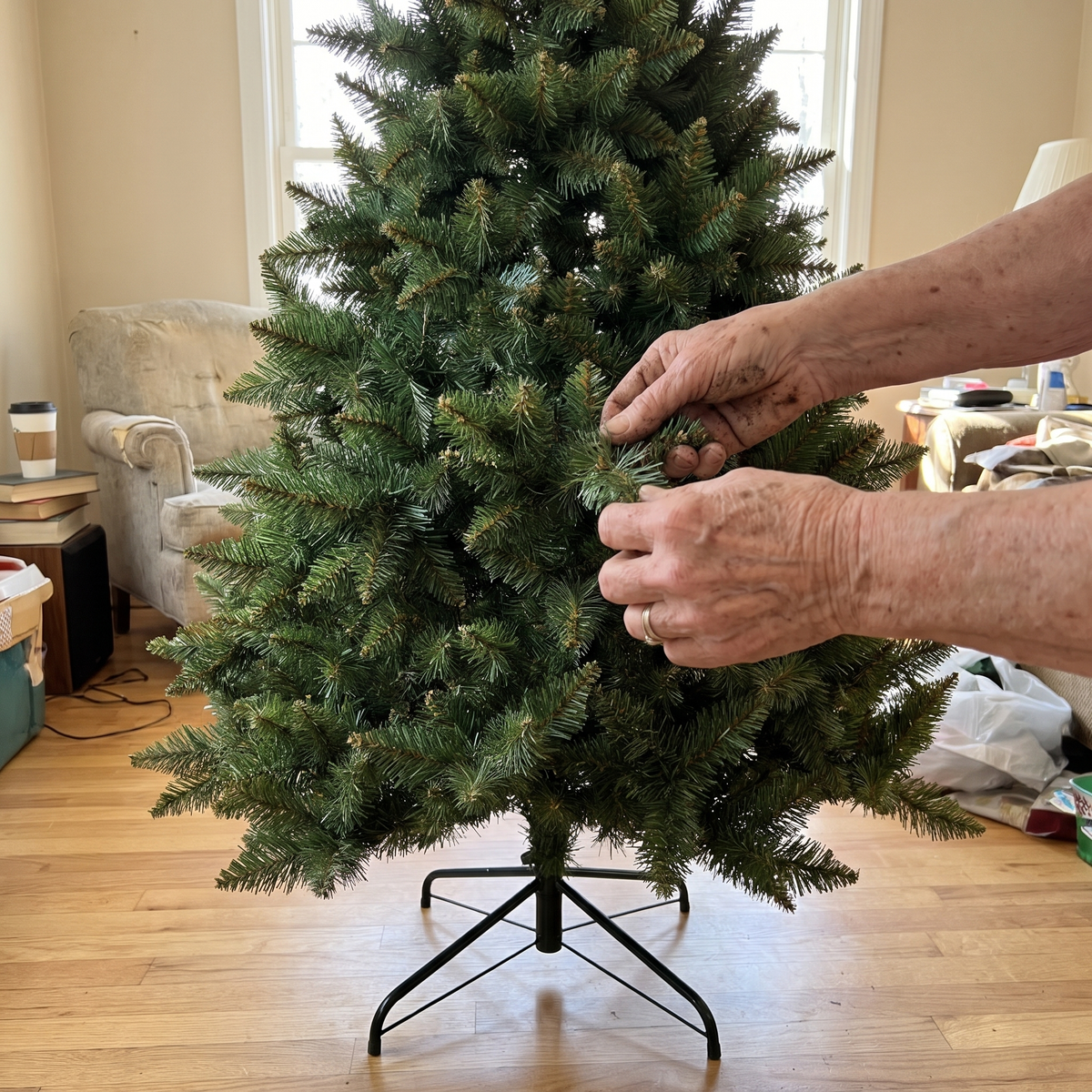 Fluffing the branches of the 5 ft tree
