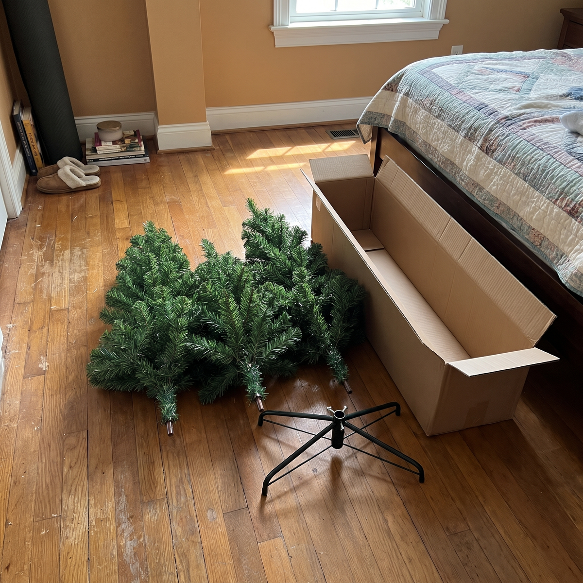 Three tree sections and stand next to the storage box