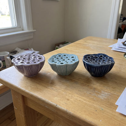 All three lotus pod vase colors side by side
