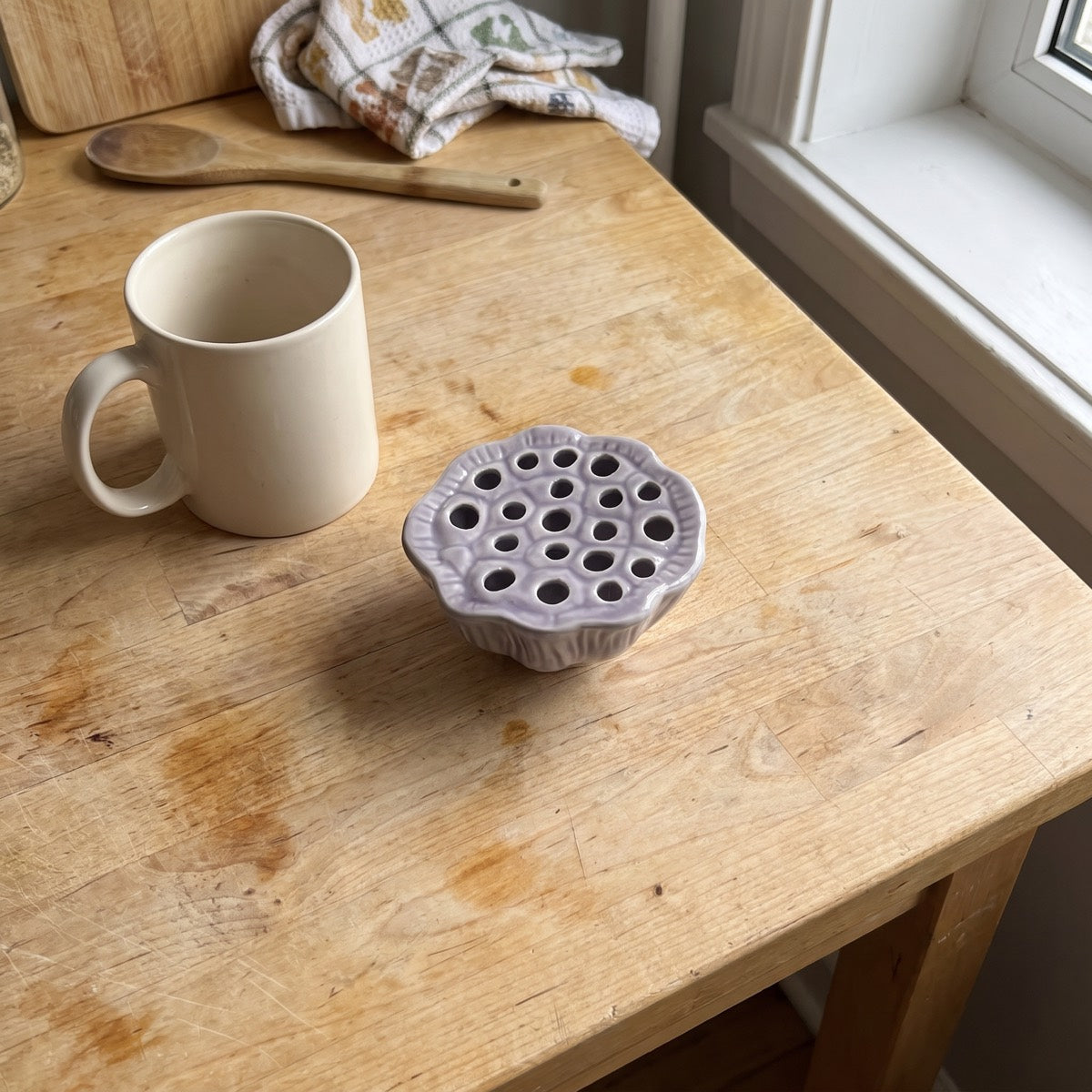 Top view of the Morning Fog lotus pod vase showing the holes
