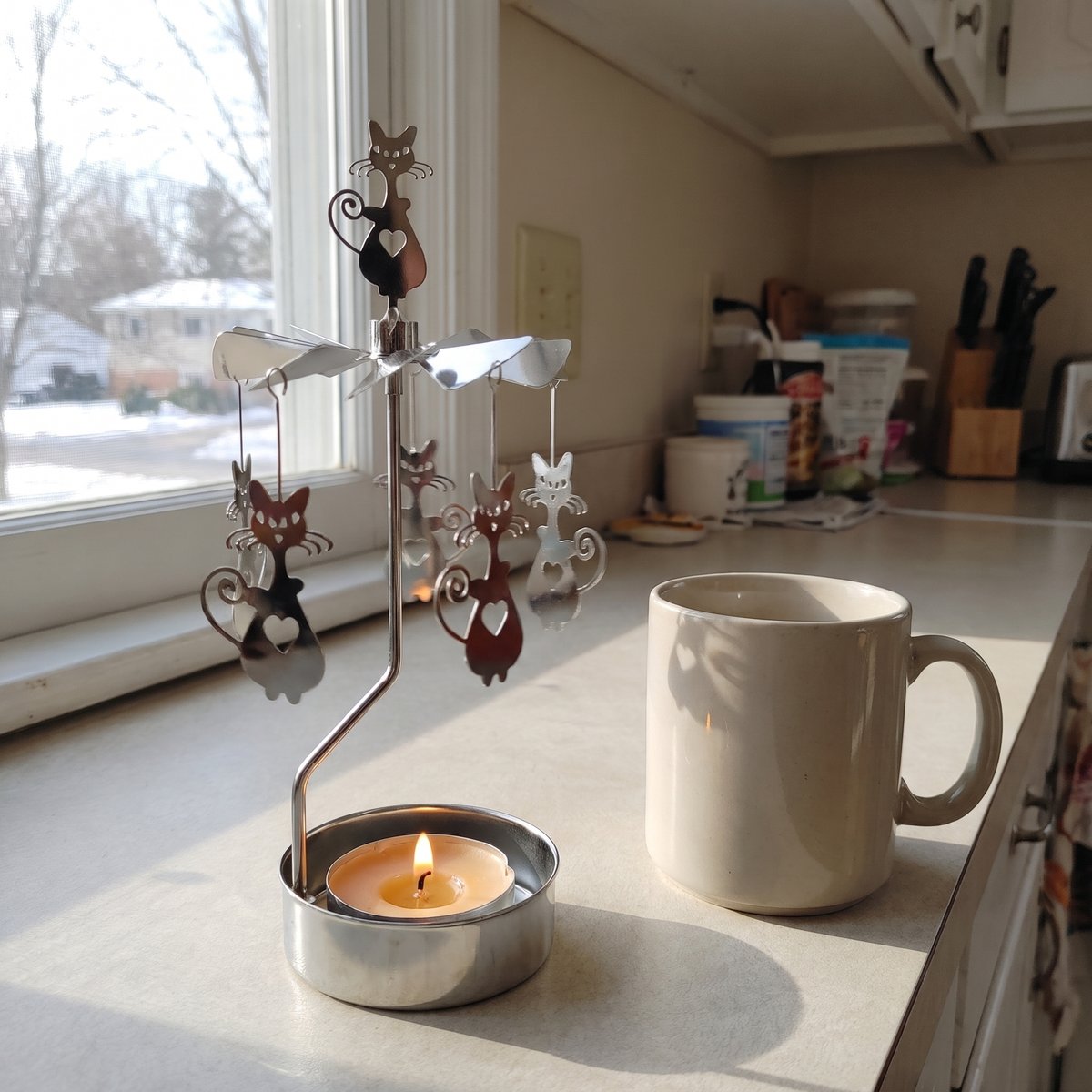 Margit's self-spinning candle carousel, Cat design
